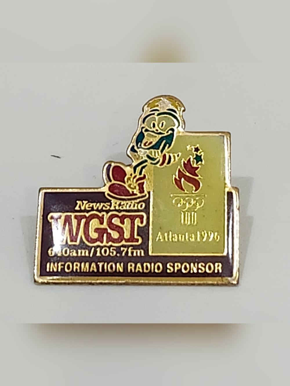 VTG 1996 Atlanta Olympic Games Lapel Pin Sponsor WGST News Radio Izzy Mascot